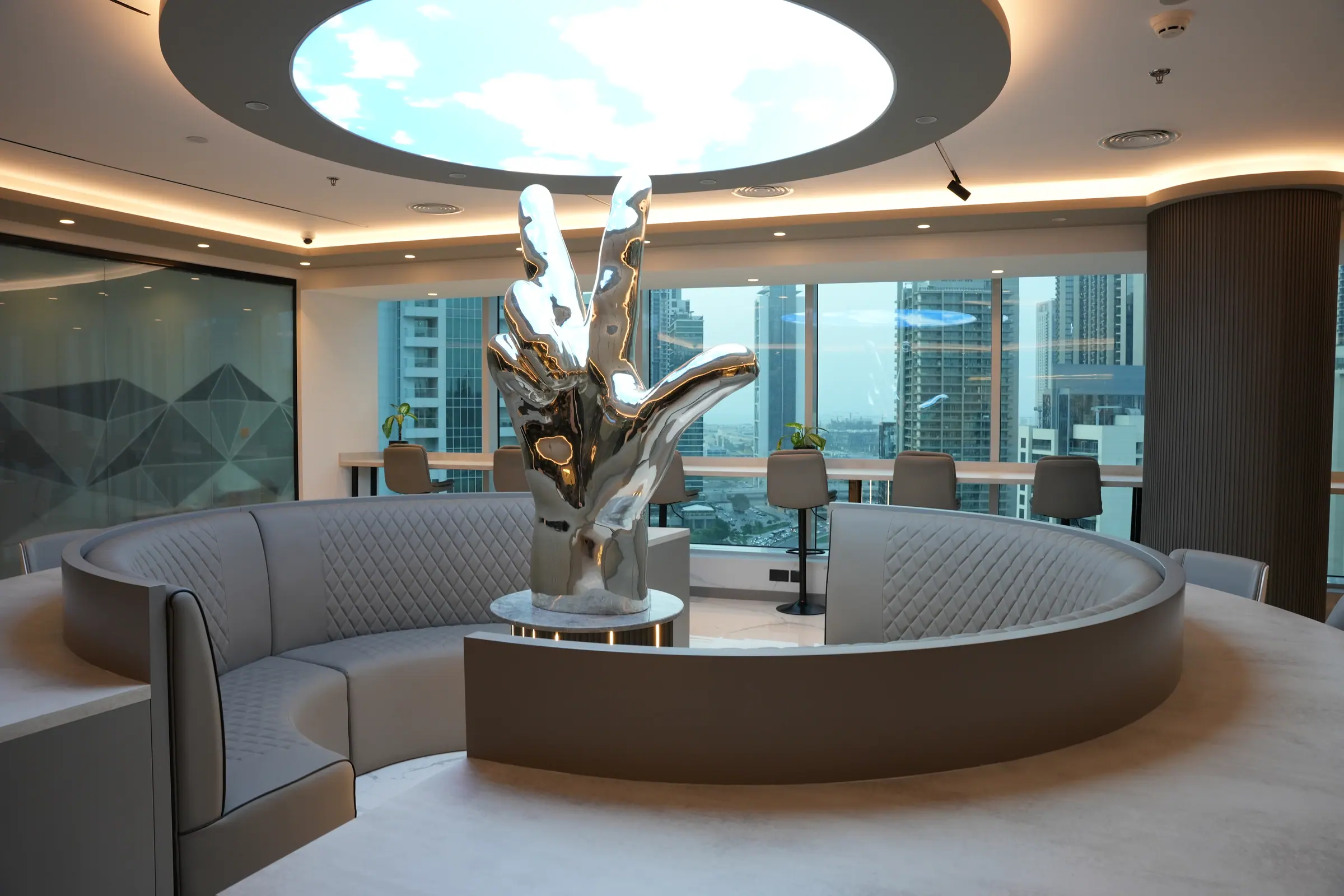 Booth seating around the sculpture in the coworking lounge
